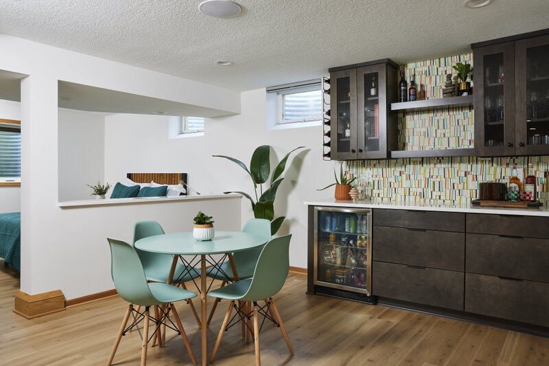Murphy Bros. Design Build Remodel shows how they turned this dark dysfunctional basement into a lively liveable entertainment center.