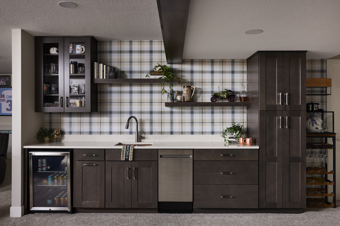 After_Basement remodel wet bar with stained cabinets and wallpaper_Murphy Bros._Plymouth MN