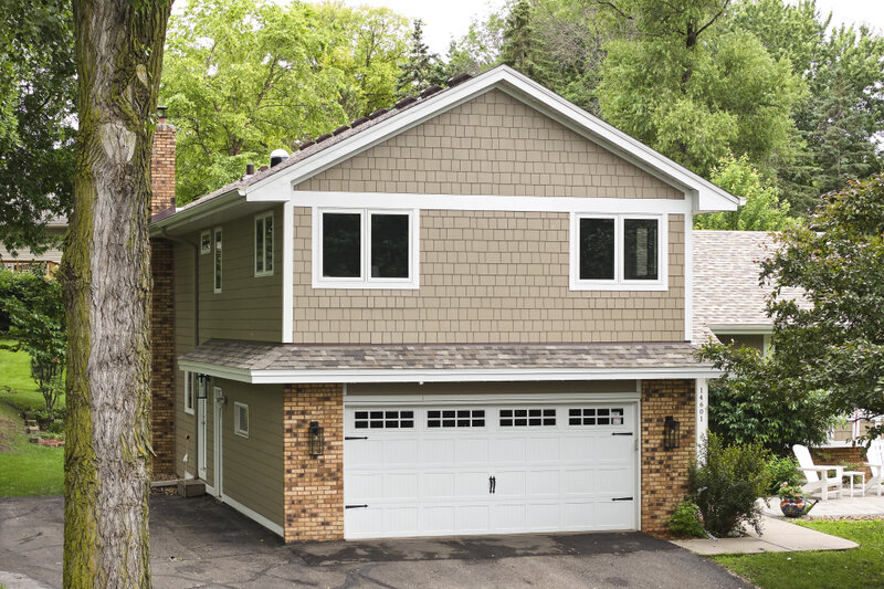 This custom home addition remodel by Murphy Bros. Design Build Remodel in Wayzata blends modern amenities with timeless design—new bedrooms, a luxury bath, and room to grow.