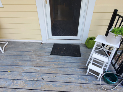 Before image of kitchen view of entrance to deck